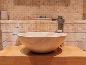 a large bowl sink on a counter in a bathroom at Pass the Keys Elegant stylish home in historic town centre sleeps 3 in Moreton in Marsh +10 photos