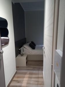 Postel nebo postele na pokoji v ubytování Residenza Novi