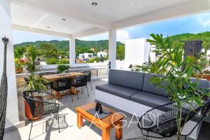 Coin salon dans l'établissement VILLA GADI - Roof Garden - Pizza Oven - Tiny Pool