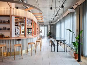 Um restaurante ou outro lugar para comer em STAYERY Frankfurt Sachsenhausen