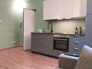 A kitchen or kitchenette at 2 Via Fabio Mangone
