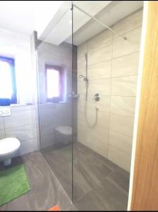 Ein Badezimmer in der Unterkunft Ferienwohnung Haus Germania