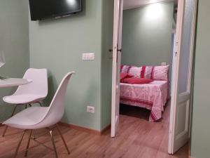 A bed or beds in a room at 2 Via Fabio Mangone