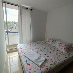 Ένα ή περισσότερα κρεβάτια σε δωμάτιο στο Fernando hermoso apartamento 3 alcobas piscina