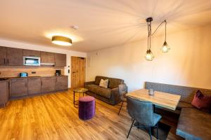 Kuchyň nebo kuchyňský kout v ubytování Rustika - Appartements & Spa