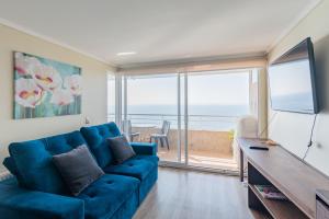 TV a/nebo společenská místnost v ubytování Neptuno Apartment 2BR W/Sea View & Parking
