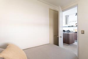 Kuchyň nebo kuchyňský kout v ubytování Neptuno Apartment 2BR W/Sea View & Parking