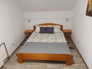 Postel nebo postele na pokoji v ubytování Apartment Andrea