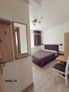 Villa Krysia 50 m do morza客房内的一张或多张床位