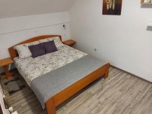 Postel nebo postele na pokoji v ubytování Apartment Andrea