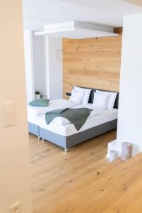 Postel nebo postele na pokoji v ubytování mariaAPPARTMENTS
