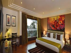 Fortune Park Moksha, Mcleodganj - Member ITC Hotels' Group客房内的一张或多张床位