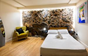 Posteľ alebo postele v izbe v ubytovaní The Yard Hostel