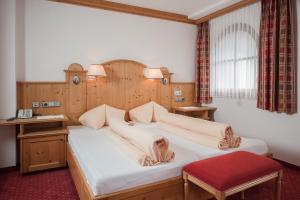 Łóżko lub łóżka w pokoju w obiekcie Hotel Dornauhof