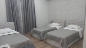 Voodi või voodid majutusasutuse Hotel Rustaveli toas