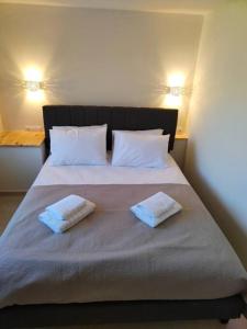 Postel nebo postele na pokoji v ubytování THROUBI VILLA + 23 fotografií
