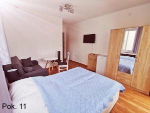Villa Krysia 50 m do morza客房内的一张或多张床位