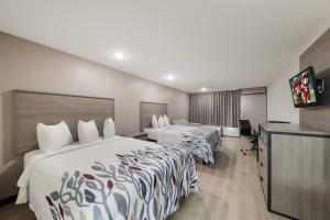 Cama o camas de una habitación en Red Roof Inn & Conference Center McKinney