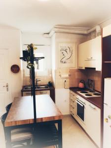 Kuchyň nebo kuchyňský kout v ubytování Thalassographia Serifos