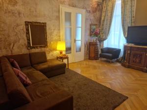 Televízia a/alebo spoločenská miestnosť v ubytovaní Urban Flats Vienna City Center