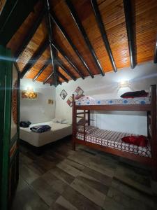 Postel nebo postele na pokoji v ubytování Finca Hotel karey -Quindio