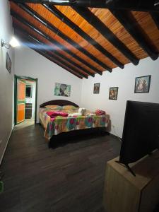 Postel nebo postele na pokoji v ubytování Finca Hotel karey -Quindio