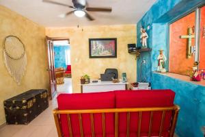 TV a/nebo společenská místnost v ubytování Hotel Tequila Cancun