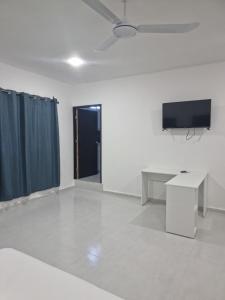 Μια τηλεόραση ή/και κέντρο ψυχαγωγίας στο Casa Neptuno Tulum