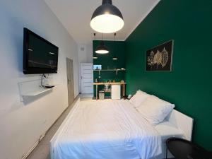 Posteľ alebo postele v izbe v ubytovaní Apartamenty Nowy Rynek