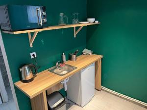 Kuchyňa alebo kuchynka v ubytovaní Apartamenty Nowy Rynek