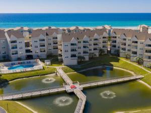 an aerial view of an apartment complex near the ocean at Baywatch #C5 in Pensacola Beach