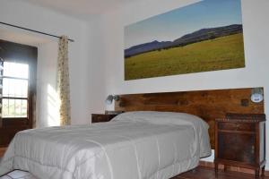 Ένα ή περισσότερα κρεβάτια σε δωμάτιο στο Finca el Vizconde Naturaleza con tus hijos