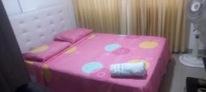 Ένα ή περισσότερα κρεβάτια σε δωμάτιο στο Apartaestudio 4 Amoblado el Caney