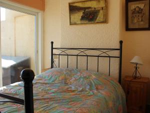 Posteľ alebo postele v izbe v ubytovaní Appartement Port-la-Nouvelle, 3 pièces, 4 personnes - FR-1-229C-77