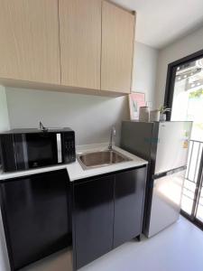 Køkken eller tekøkken på VIP Great Hill Phuket Airport