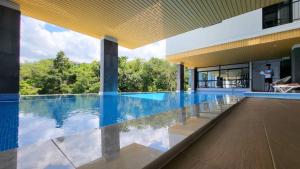Swimmingpoolen hos eller tæt på VIP Great Hill Phuket Airport