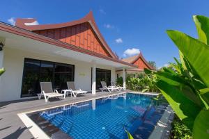 an image of a swimming pool in a villa at The Casita Phuket (SHA+) in Ban Bo Sai Klang