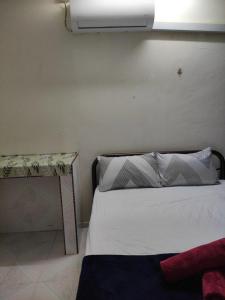 Postel nebo postele na pokoji v ubytování CiTY Homestay Budget 2bedrooms Midtown Kuala Terengganu