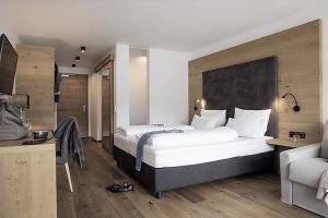 Posteľ alebo postele v izbe v ubytovaní Eden Boutique Hotel