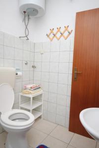 Kúpeľňa v ubytovaní Apartment Sali 8152b