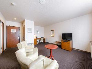 Tabist Abashiri Central Hotel的电视和/或娱乐中心