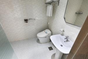 Koupelna v ubytování Buan Tourist Hotel