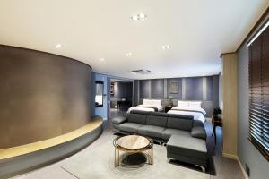 Postel nebo postele na pokoji v ubytování Buan Tourist Hotel