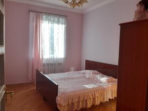 Postel nebo postele na pokoji v ubytování Guest House Sevan