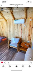 a room with a bed and a table in a cabin at Hellena in Sarajevo
