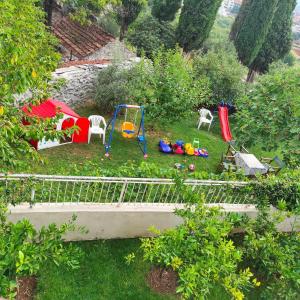 a backyard with a playground with a play set at Nijona 1 in Trebinje