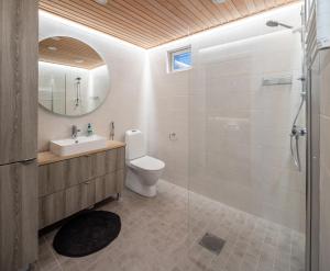 Koupelna v ubytování Tuomenkartano Apartments by Hiekka Booking