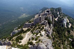 a castle on the side of a mountain at le balcon in Camps-sur-lʼAgly