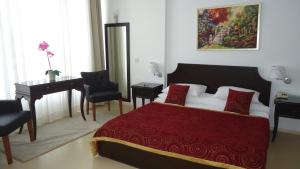 Postel nebo postele na pokoji v ubytování Ada Beach Hotel