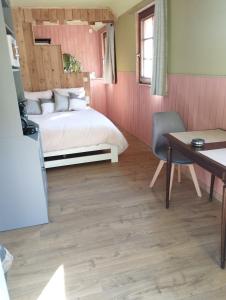 Postel nebo postele na pokoji v ubytování Couettes et Picotin